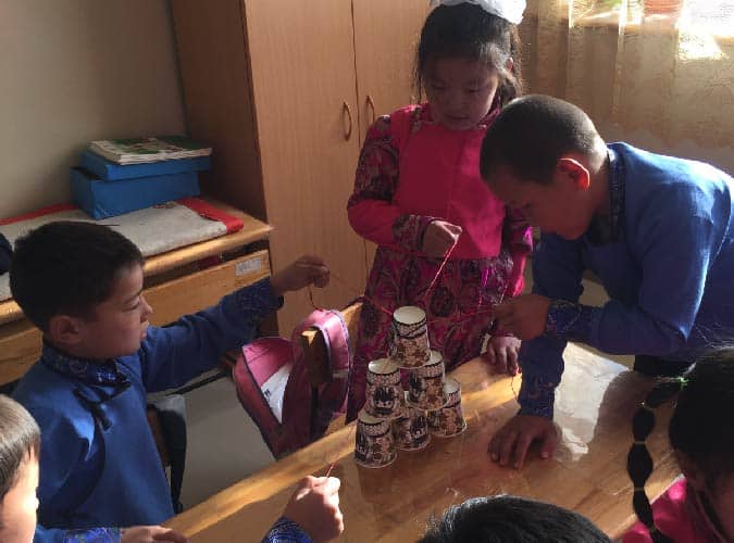 Students working together in Mongolia