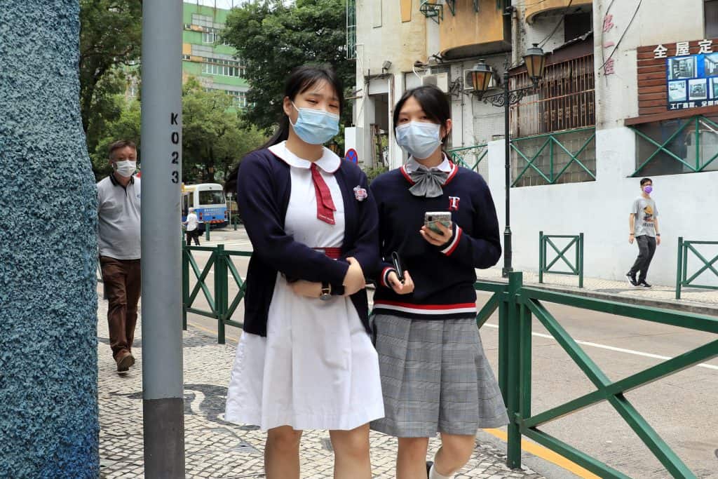 Two girls in Macau walk to school